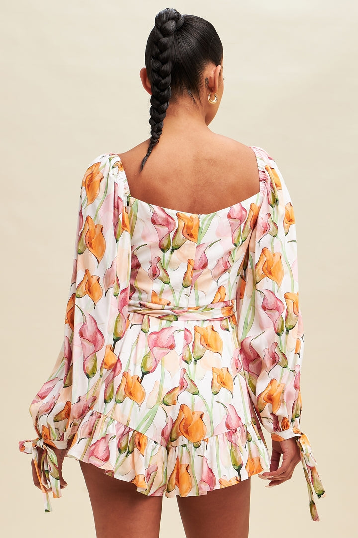 Fashion Off Shoulder White Peach Multi-Color Floral Print V-Neck Tie-Up Ruffle Romper with Bell Sleeve