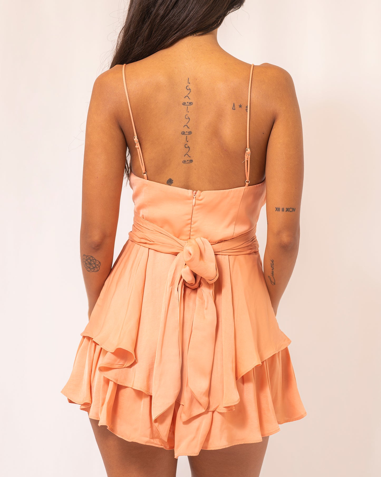 Elegant Strap Orange Tie-Up Ruffle Romper