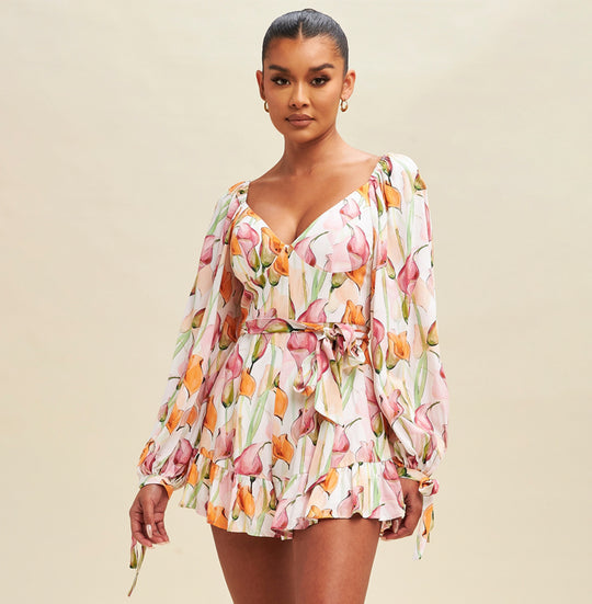 Fashion Off Shoulder White Peach Multi-Color Floral Print V-Neck Tie-Up Ruffle Romper with Bell Sleeve
